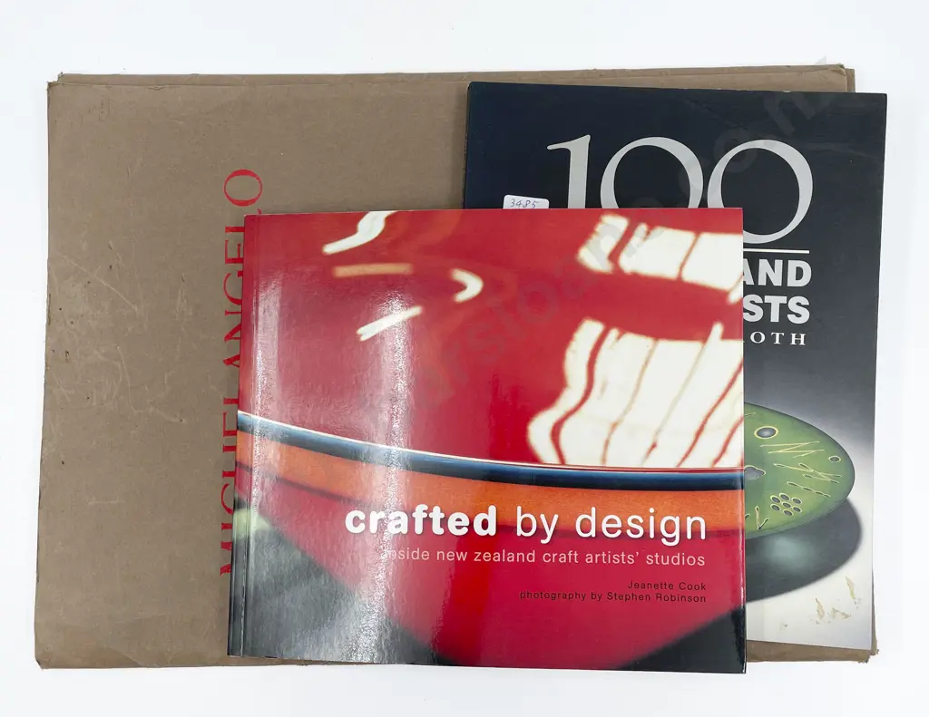 Two Books on NZ Craft Artists Together With Folder of Michelangelo Prints Image 1++