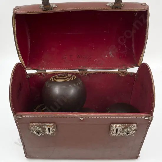 Four Lawn Bowls in Case