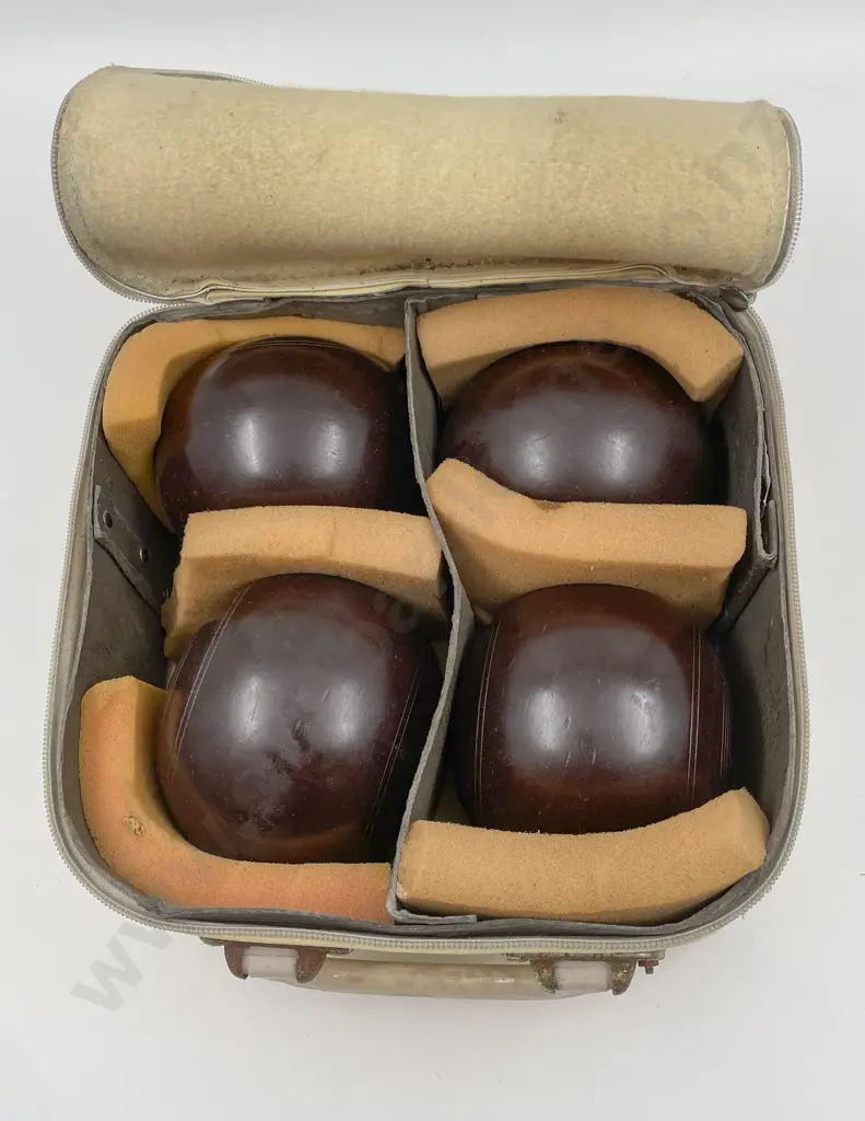 Four Lawn Bowls in Case Image 1++