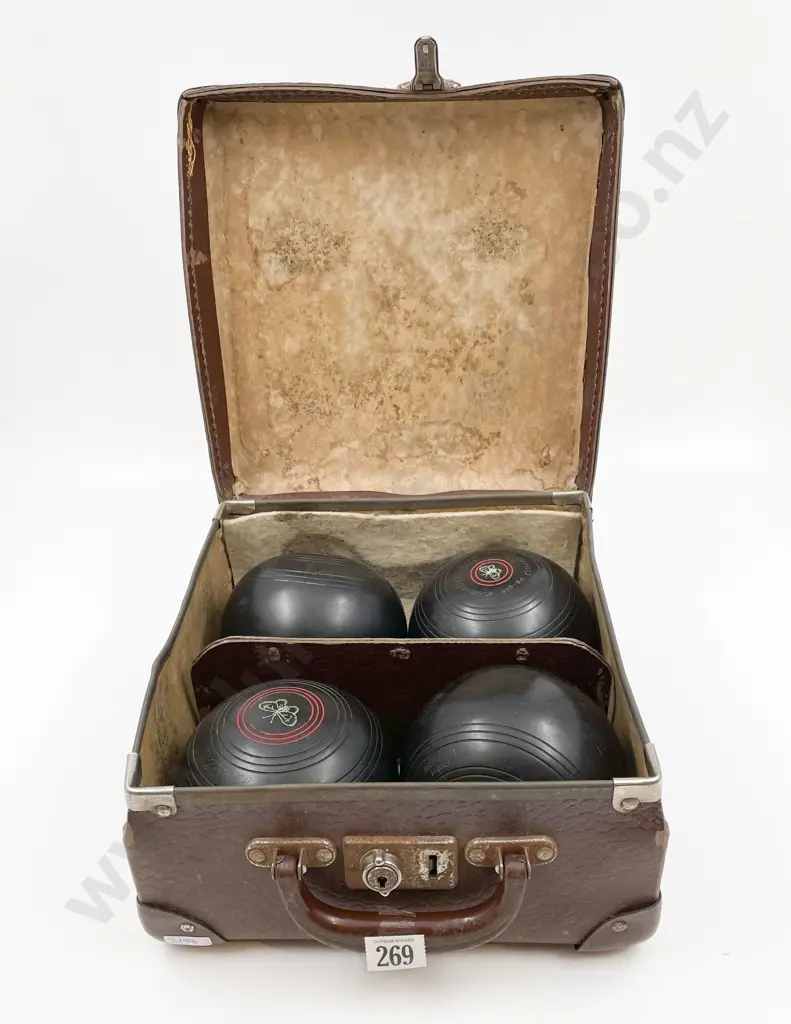 Four Lawn Bowls in Case Image 1++