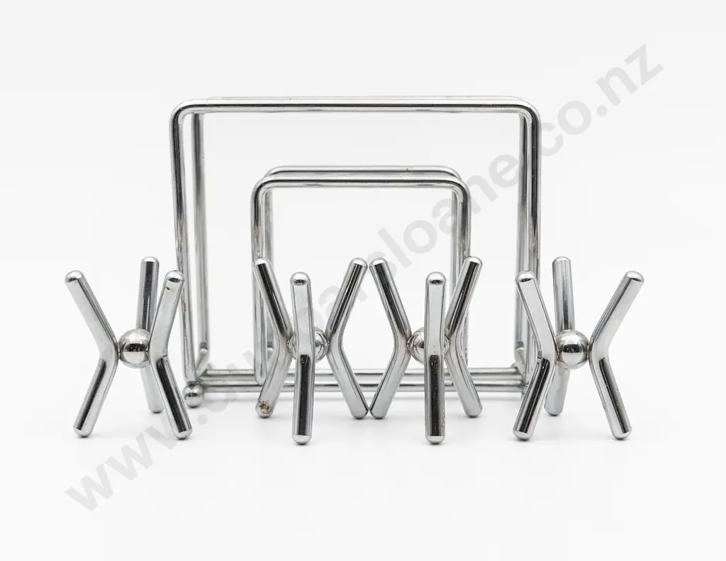 Set of four Heavy Chrome Egg Cups and a Table Napkin Holder Image 1++