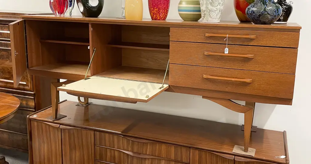 A Beautility Teak Sideboard Image 1++
