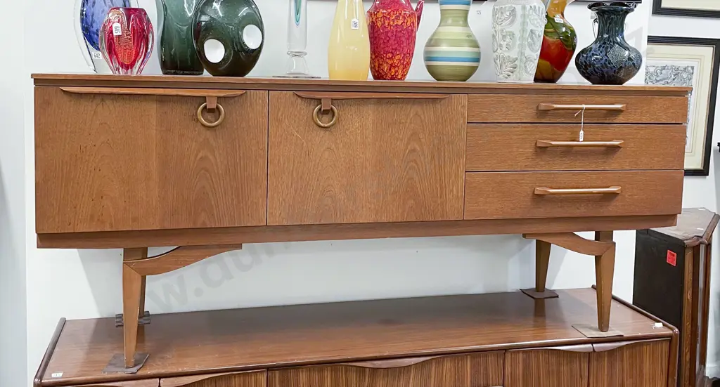 A Beautility Teak Sideboard Image 1++
