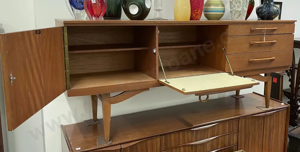 A Beautility Teak Sideboard Image 1++