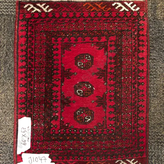 Three Small Persian Style Rugs