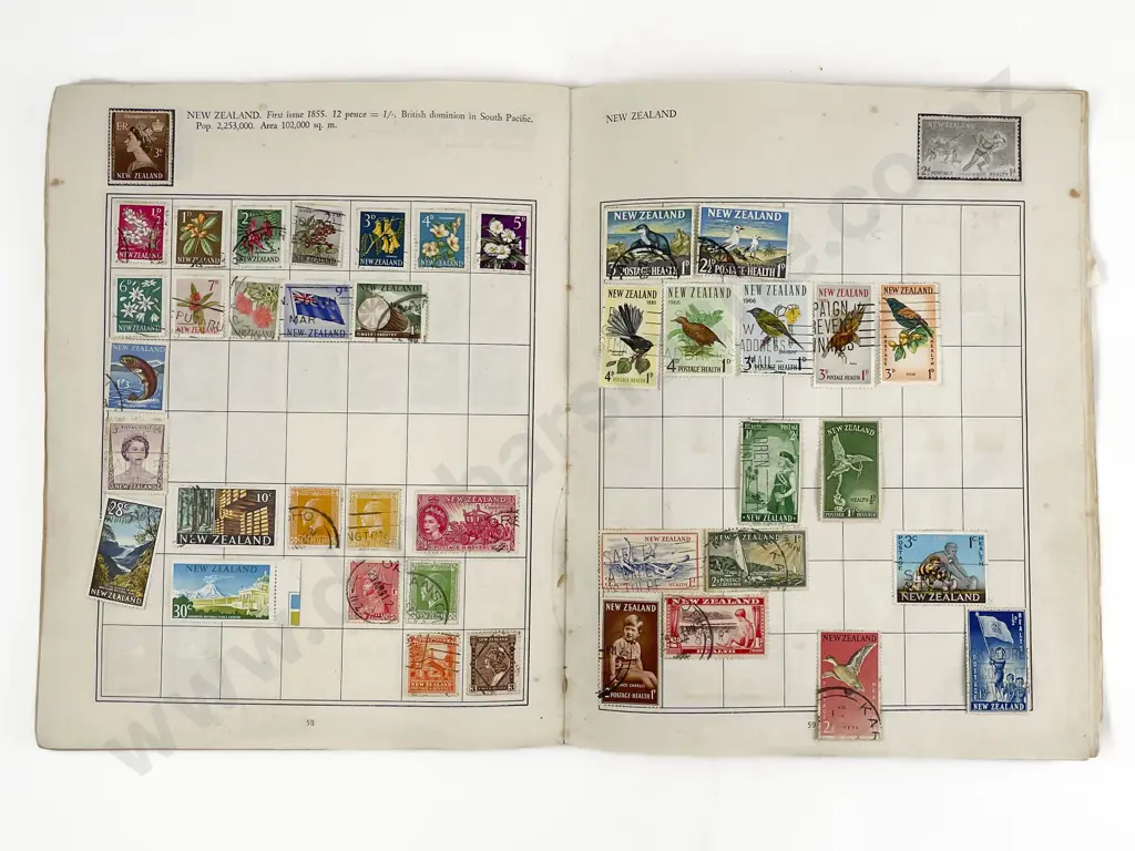 Four Vintage World Stamp Albums Image 1++