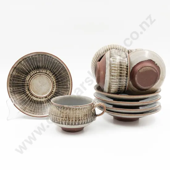 Glazed Pottery Cups and Saucers