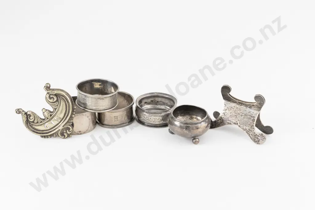 Four Various S/S Napkin Rings Image 1++