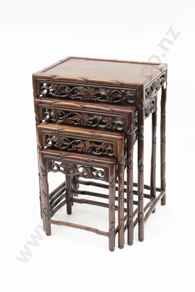 A Nest Of Four Chinese Rosewood Tables Image 1++