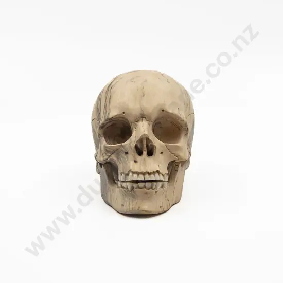A Good Quality Javanese Carved Wood Skull With Bone Teeth