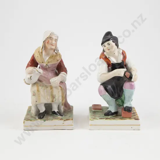 Pair Of Early Staffordshire Seated Figures Of The Cobbler & His Wife
