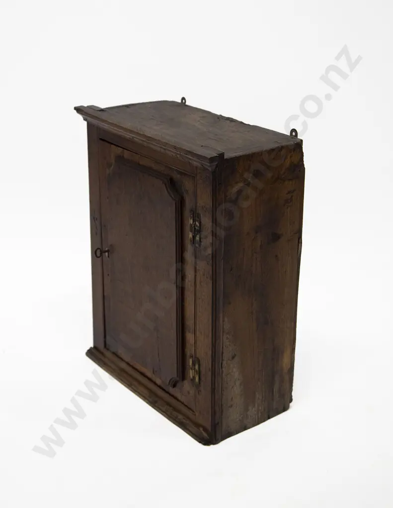 Geo III Oak Hanging Wall Cabinet. two fixed shelves enclosed by a raised panel door Image 1++
