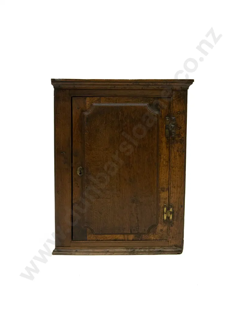 Geo III Oak Hanging Wall Cabinet. two fixed shelves enclosed by a raised panel door Image 1++