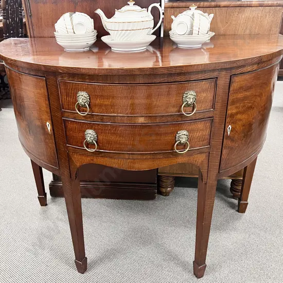 An Attractive Regency Mahogany Bow Front Sideboard