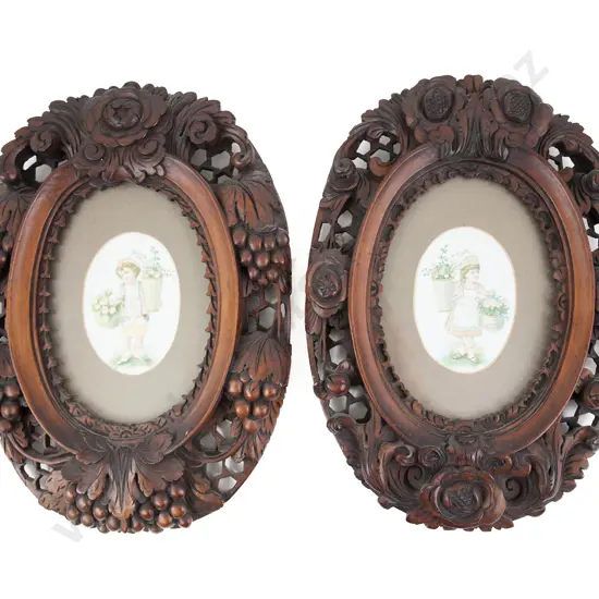 Pair Of Ornate Walnut Framed Oval Silk Wall Panels