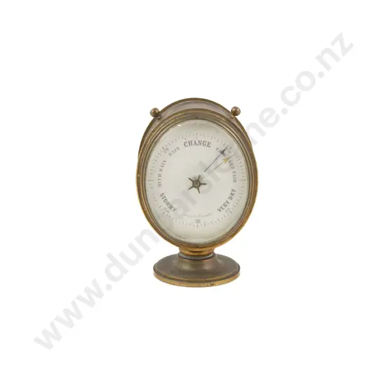 A Small Brass Cased Oval Aneroid Barometer