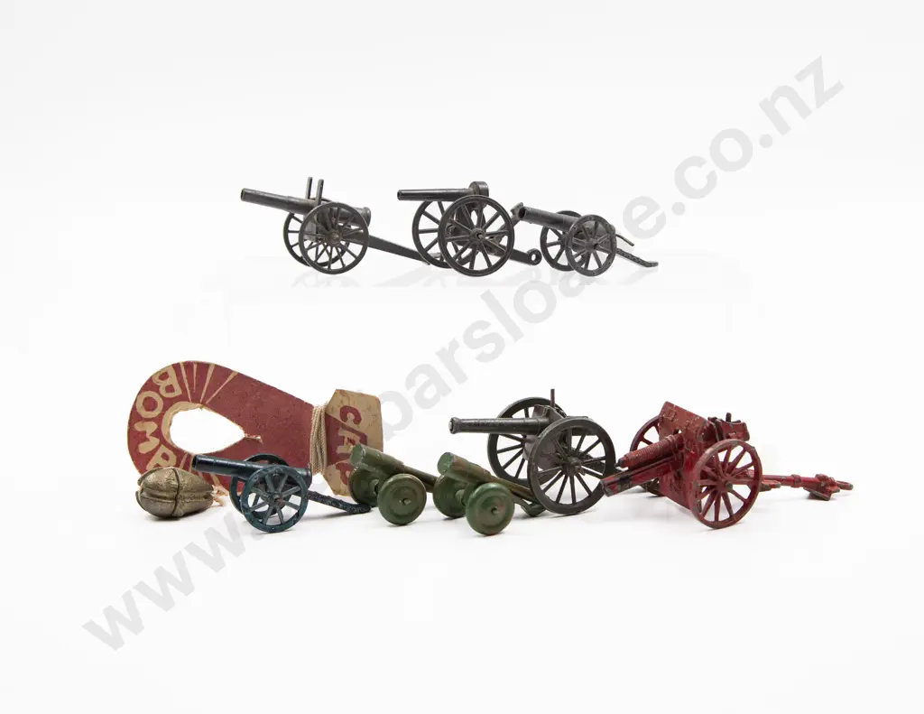 Seven Assorted Small Size Field Guns with Bomb and Shells Image 1++