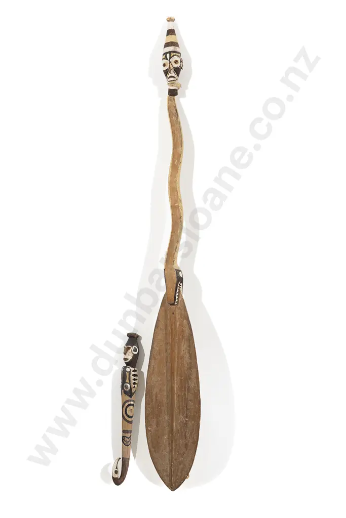 A Papua New Guinea Ceremonial Paddle And A Carved Suspension Hook Image 1++