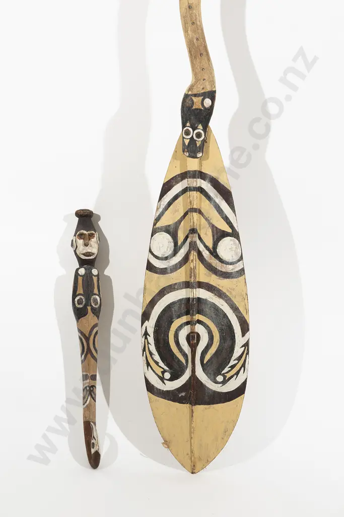A Papua New Guinea Ceremonial Paddle And A Carved Suspension Hook Image 1++