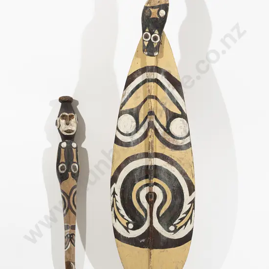 A Papua New Guinea Ceremonial Paddle And A Carved Suspension Hook