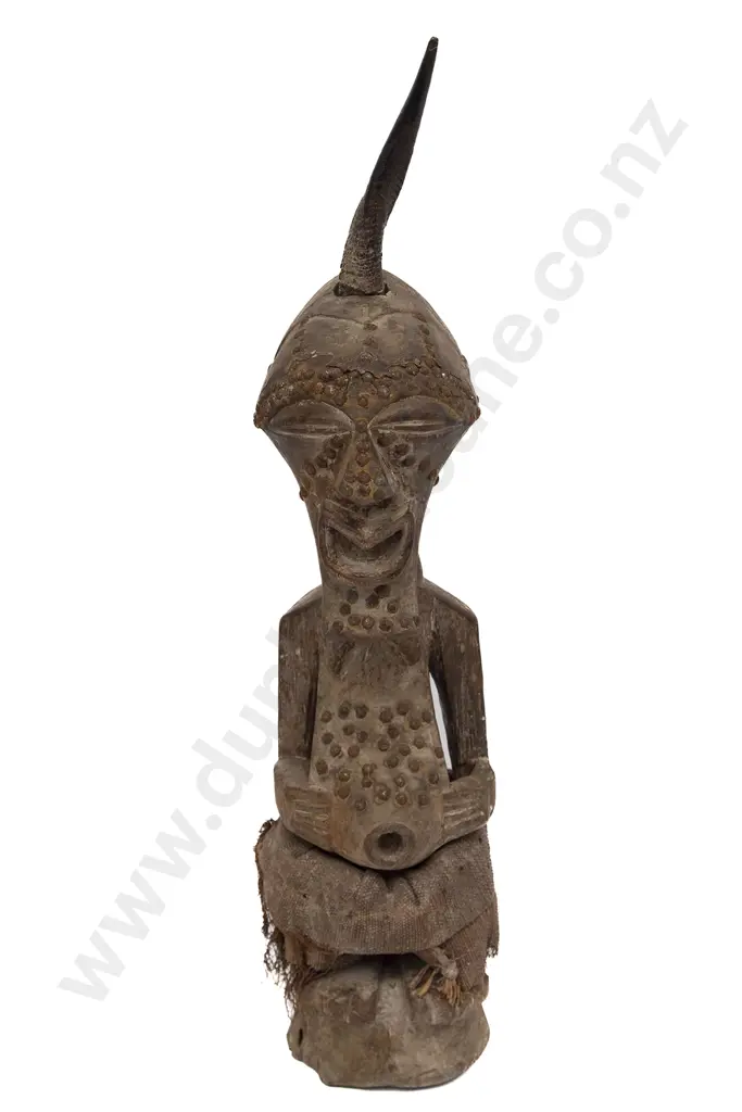 A Songye Tribe Figure With Metal Studs And Summit Horn Image 1++