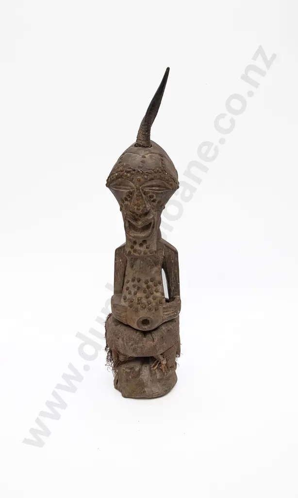 A Songye Tribe Figure With Metal Studs And Summit Horn Image 1++