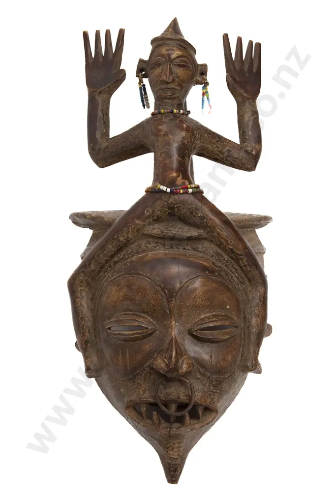 Large Helmet Mask With Surmounting Figure Image 1++
