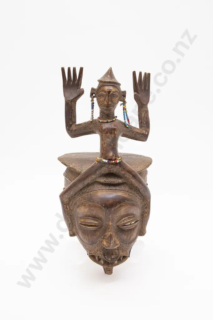 Large Helmet Mask With Surmounting Figure Image 1++