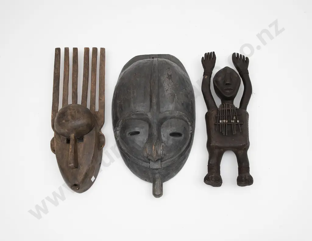 Two African Masks And A Musical Instrument Figure Image 1++
