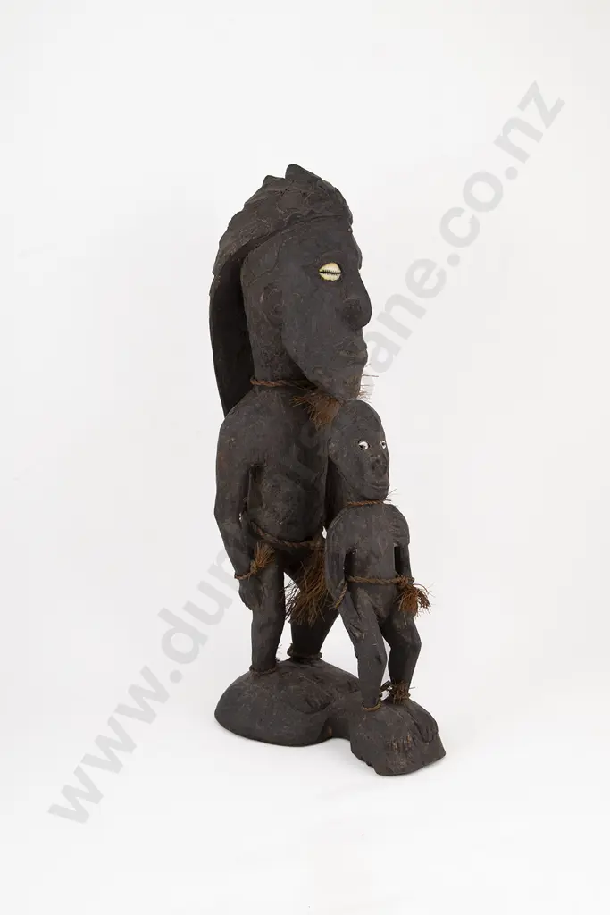 A Papua New Guinea Standing Figure With Child Image 1++