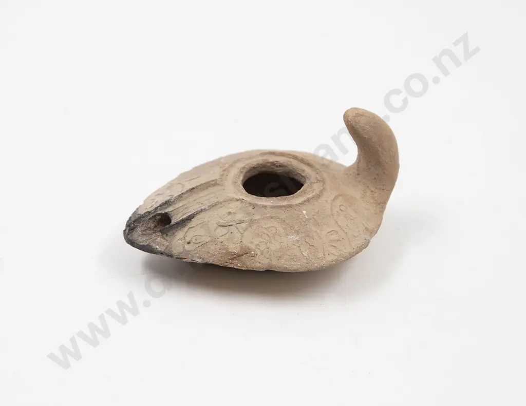 An Ancient Terracotta Oil Lamp Image 1++