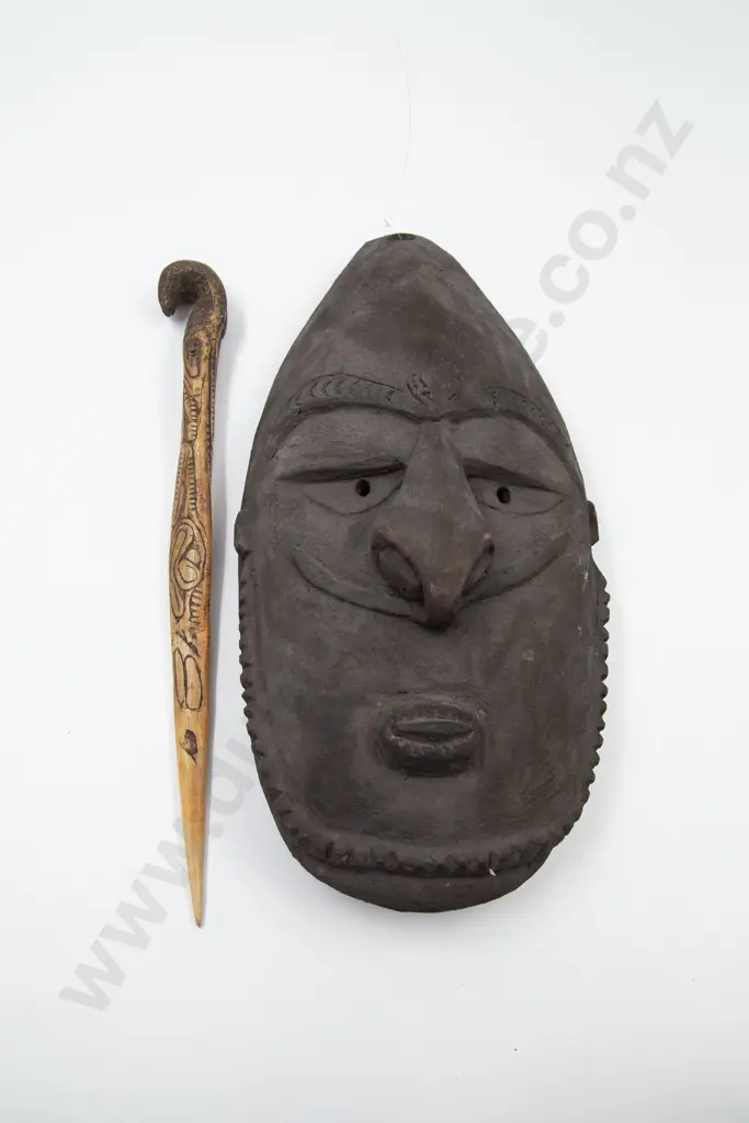 A Ramu River Mask And Bone Dagger Image 1++