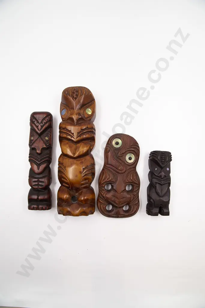 Three Carved Pou Whakairo Figures With Tiki Image 1++