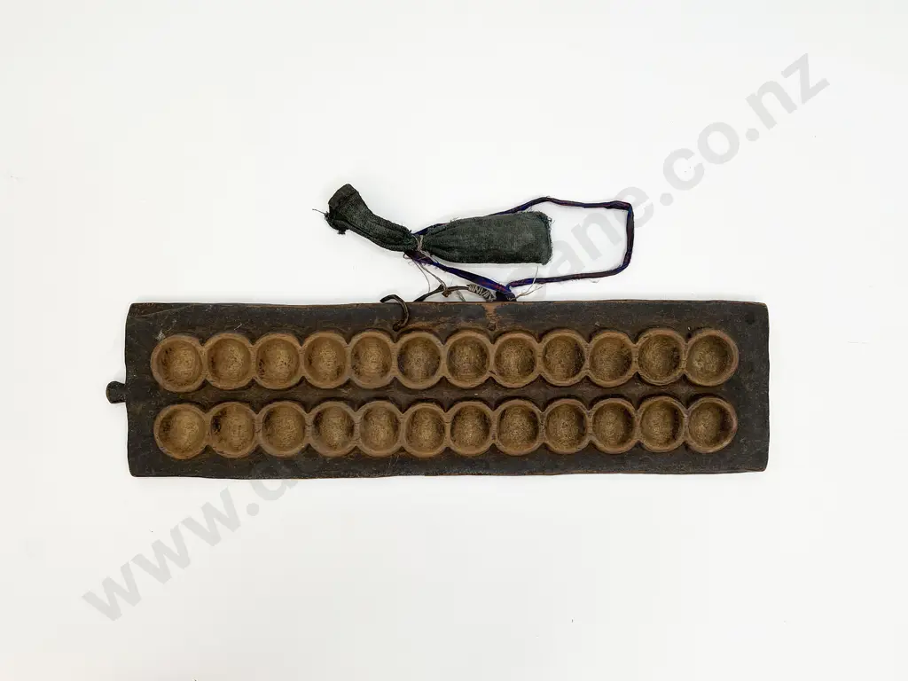 Mancala Board Game With Bag Of Playing Pieces And Door Surround Fragment Image 1++