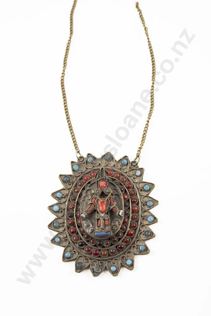 An Early 20th Century Tibetan Brass Pendant Image 1++