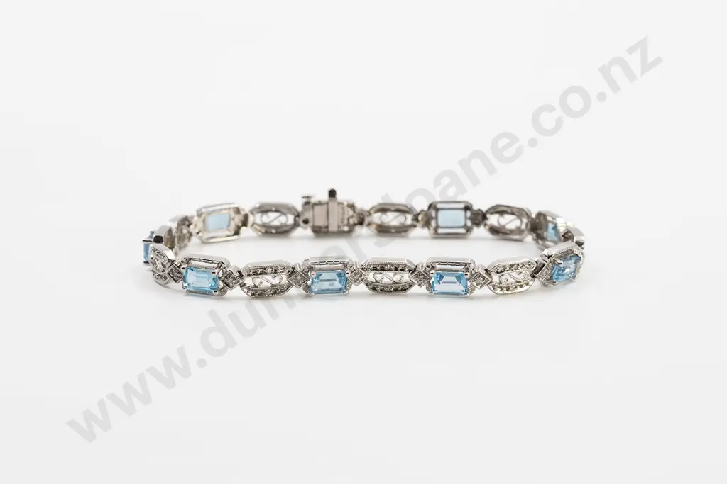 10ct White Gold Blue Topaz and Diamond Bracelet Image 1++