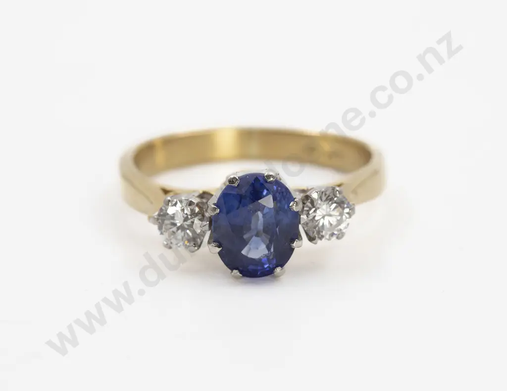 18ct Three Stone Sapphire and Diamond Bridge Ring Image 1++