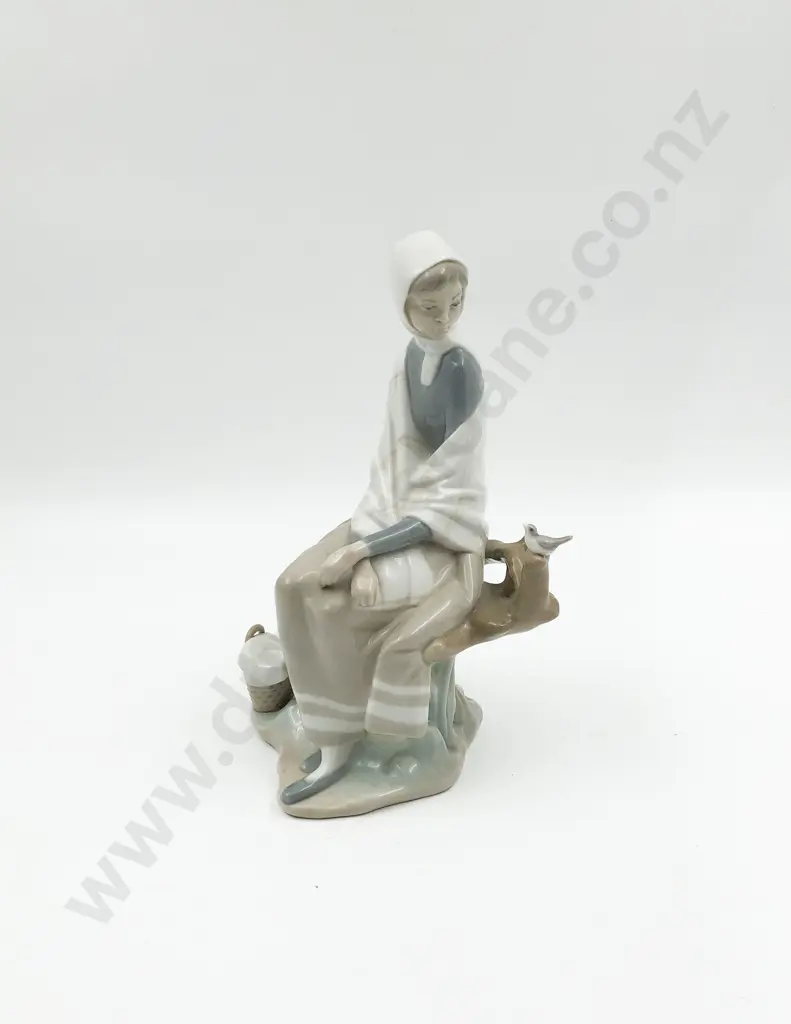 Lladro Figure of Seated Girl and Bird Image 1++