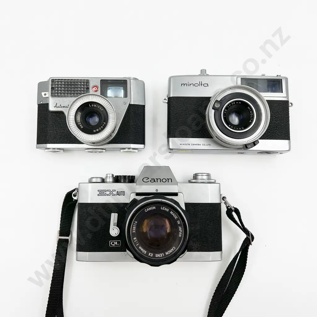 Canon T80 SLR and Two Lenses Image 1++