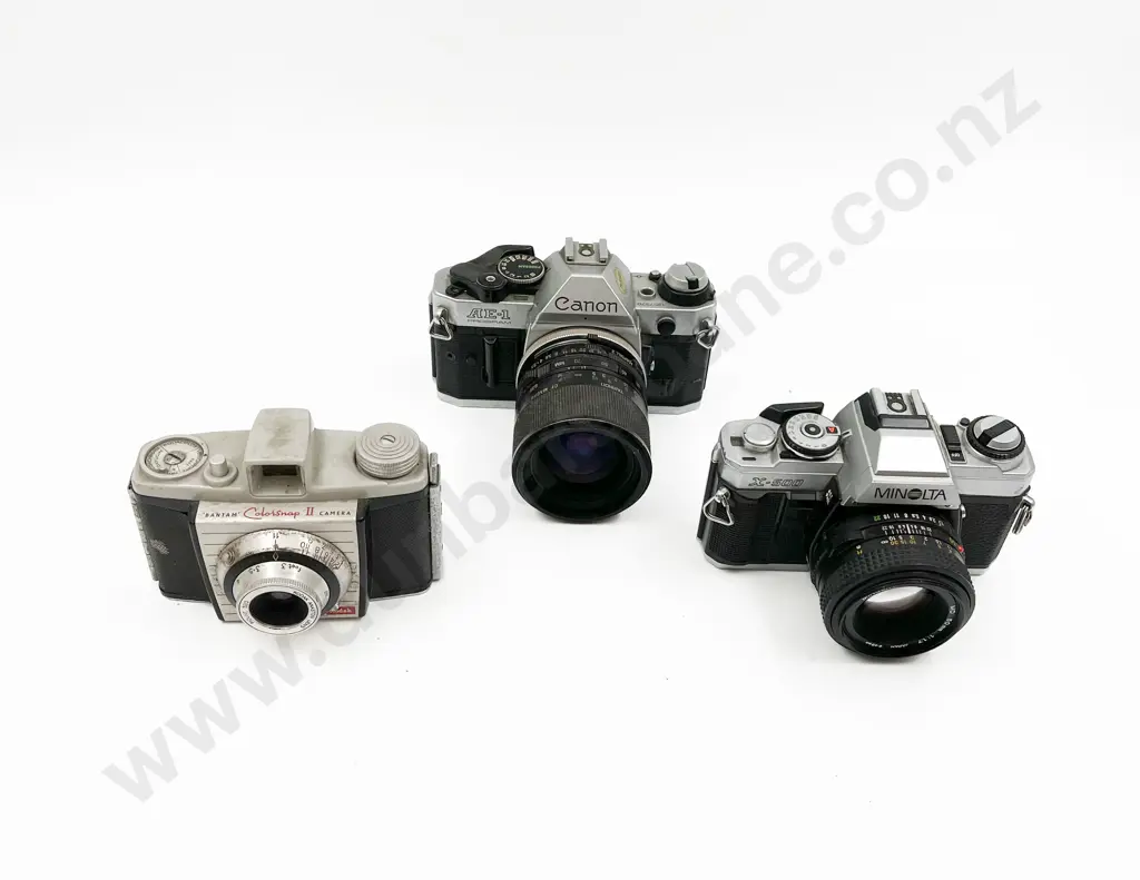 Canon AE-1 & Minolta X-500 SLRs & One Kodak Rangefinder Image 1++