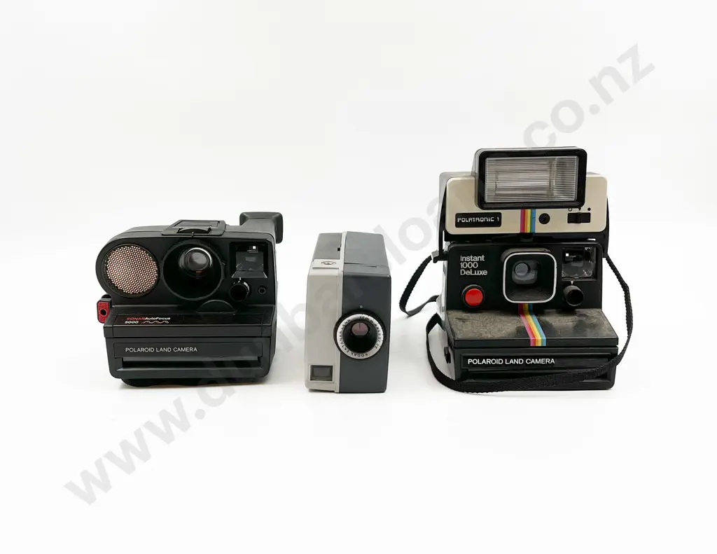Two Polaroids & One Kodak Video Camera Image 1++
