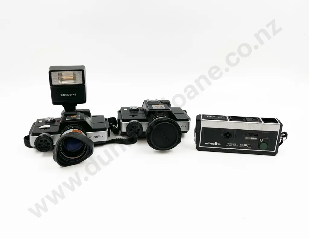 Two Minolta 110 Zoom SLRs with Pocket Autopak 250 Image 1++
