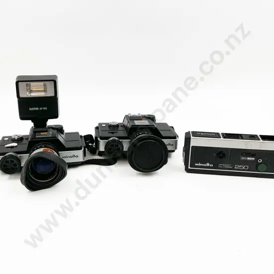Two Minolta 110 Zoom SLRs with Pocket Autopak 250