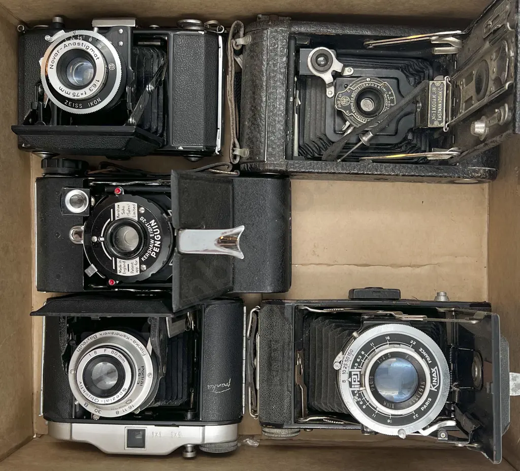 Five Assorted Folding Film Cameras Image 1++