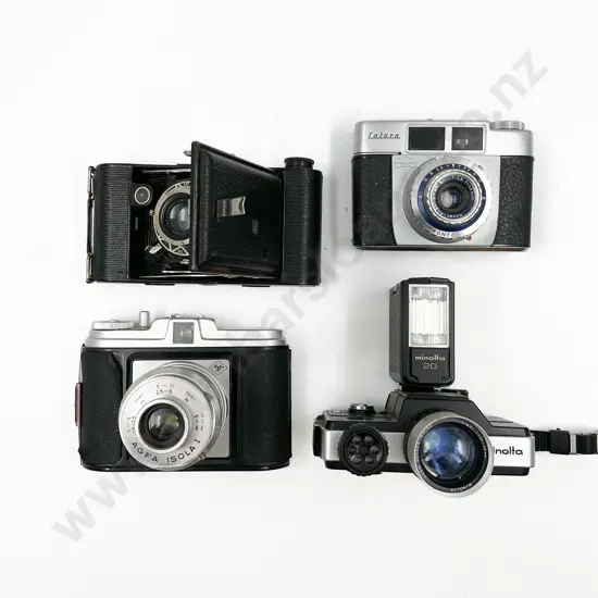 Minolta 110 Zoom SLR with Three Others