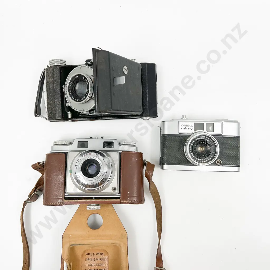 Yashica mimy Rangefinder & Two Others Image 1++