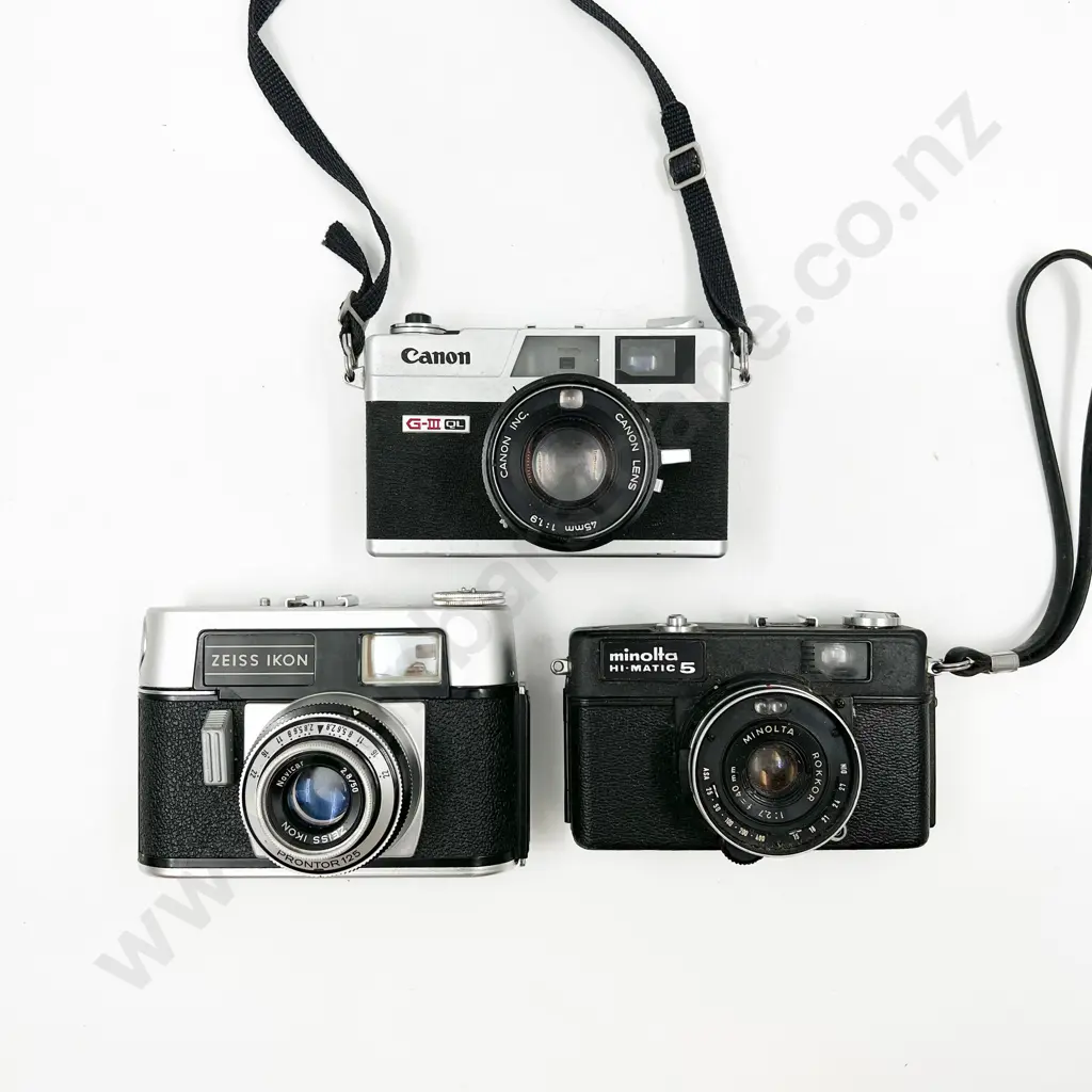 Three Rangefinder Cameras Incl. Canon & Minolta Image 1++