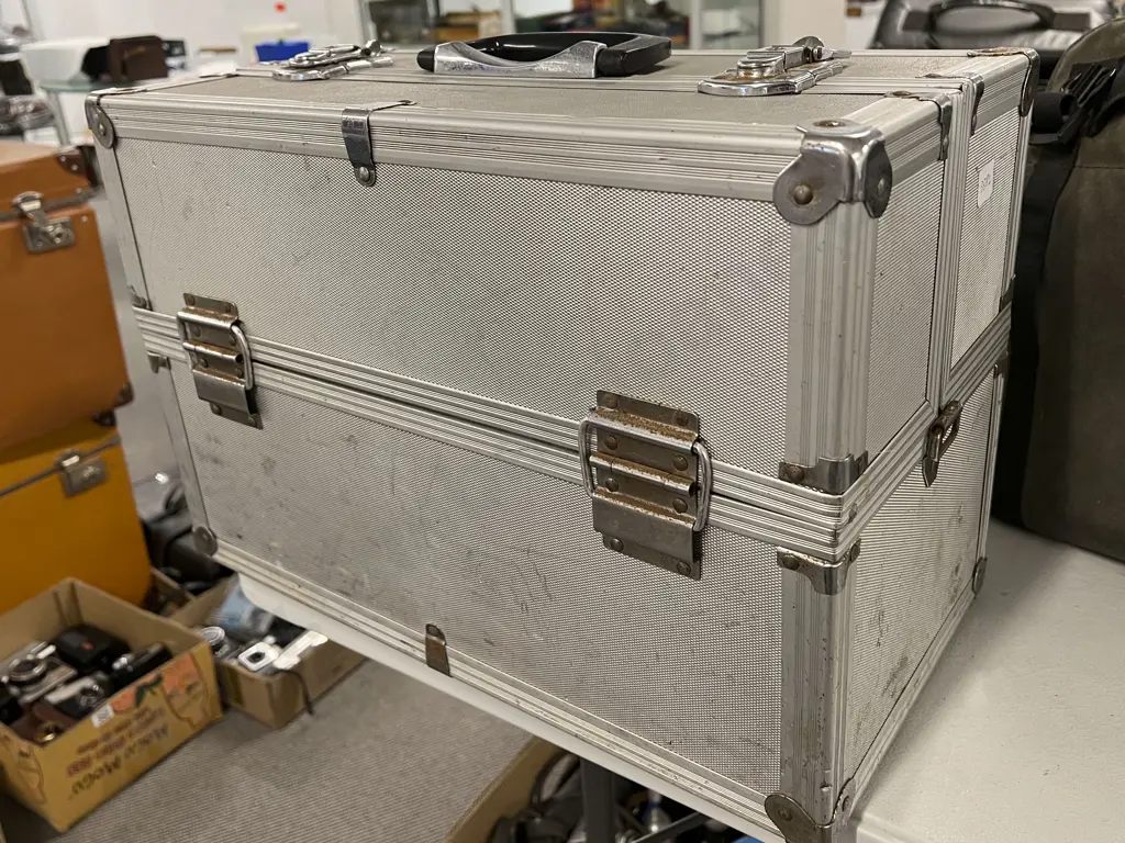 Pair of Canon EOS SLRs, One Canon Point & Shoot, One FujiFilm Telephoto Camcorder & Olympus Zoom 140 in Flight Case Image 1++