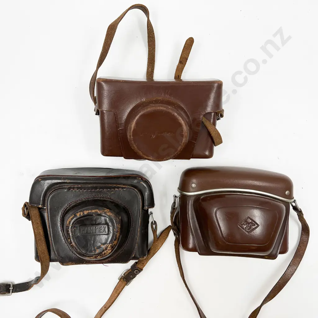 Three Rangefinder Film Cameras with Leather Cases Image 1++