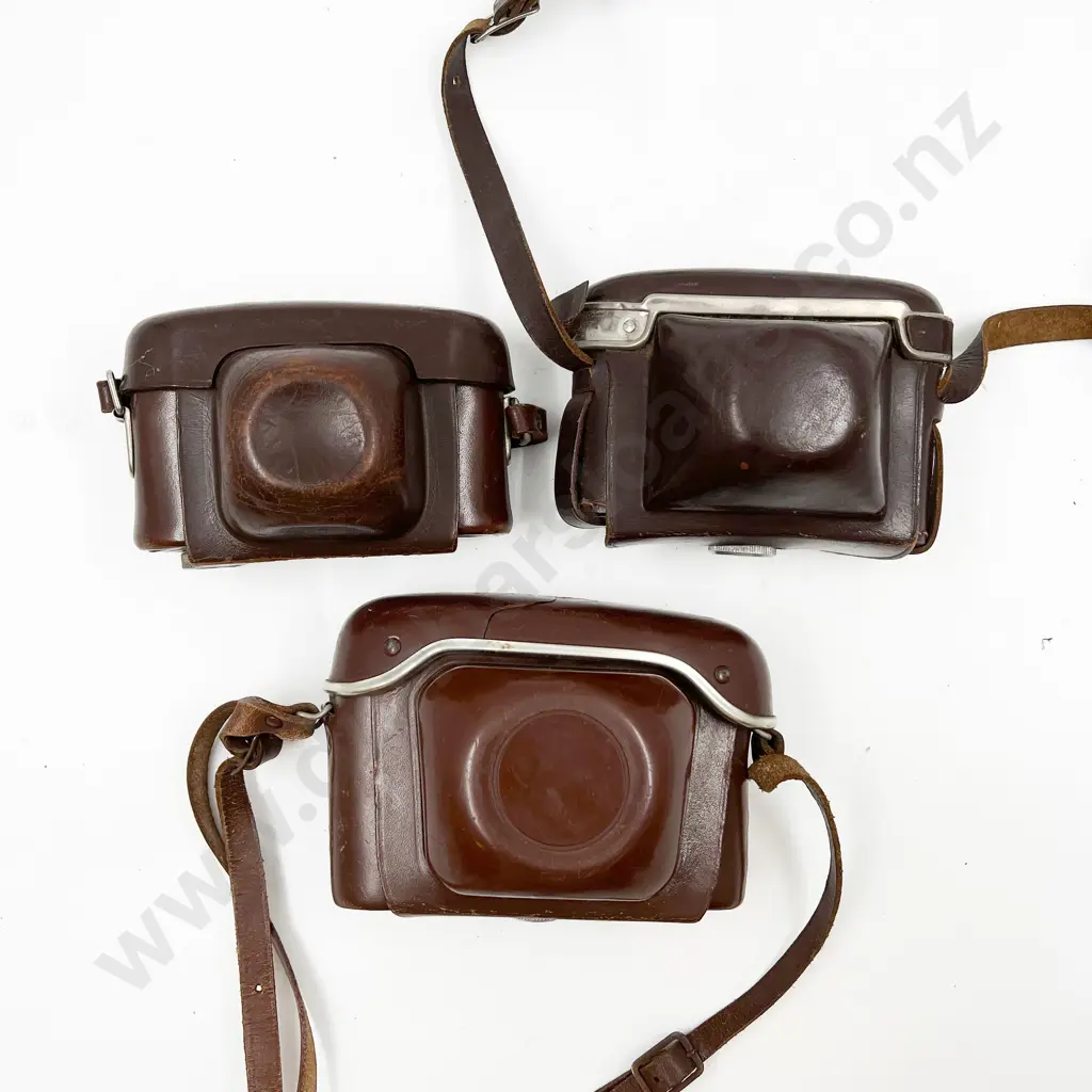 Three Rangefinder Film Cameras with Leather Cases Image 1++